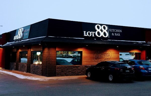 Lot 88 Orillia on Memorial Ave in winter, its sign above the entrance